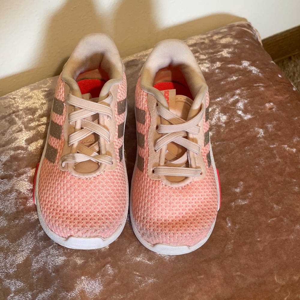 Toddler pink/orange adidas with silver stripes